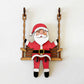 🎅60 % de réduction !!!🔥Acheter 1 Obtenez 1 Gratuit💝✨Décoration de table 3D en bois représentant le Père Noël sur une balançoire