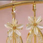 🌸 PROMO LIMITÉE 50% DE RÉDUCTION ! ✨ Boucles d'Oreilles Fleurs & Pompons – Iridescentes, Scintillantes, Dynamiques ✨