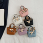 🦄💖🎀 OFFRE LIMITÉE 50% DE RÉDUCTION! Mini Sac à Main en Cuir Simulé pour Enfants – Nettoyable avec un Chiffon, Résiste aux Rayures, Livré avec un Joli Charm – Laissez Votre Petite Porter Son Propre Style Partout 🌟👛